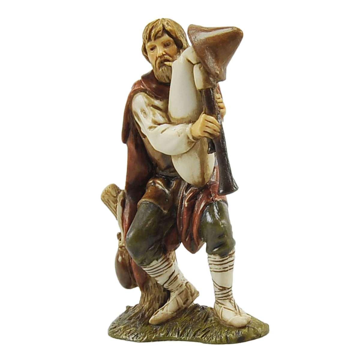 Statua presepe 10 cm zampognaro seduto su tronco