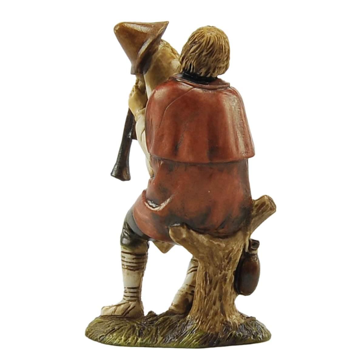 Statua presepe 10 cm zampognaro seduto su tronco