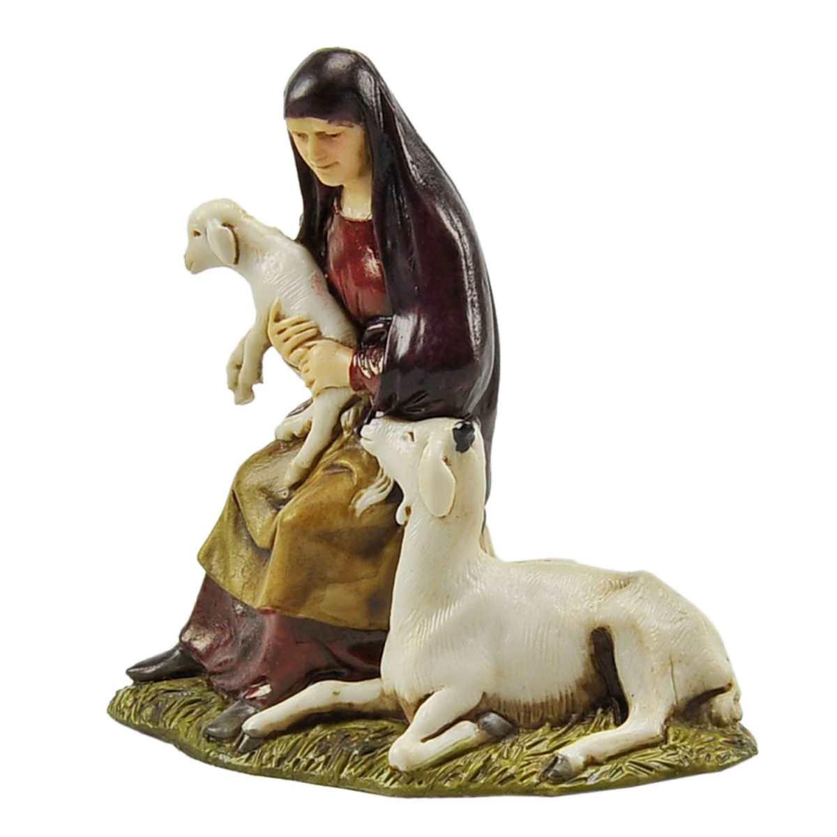Statua presepe 10 cm donna seduta capre