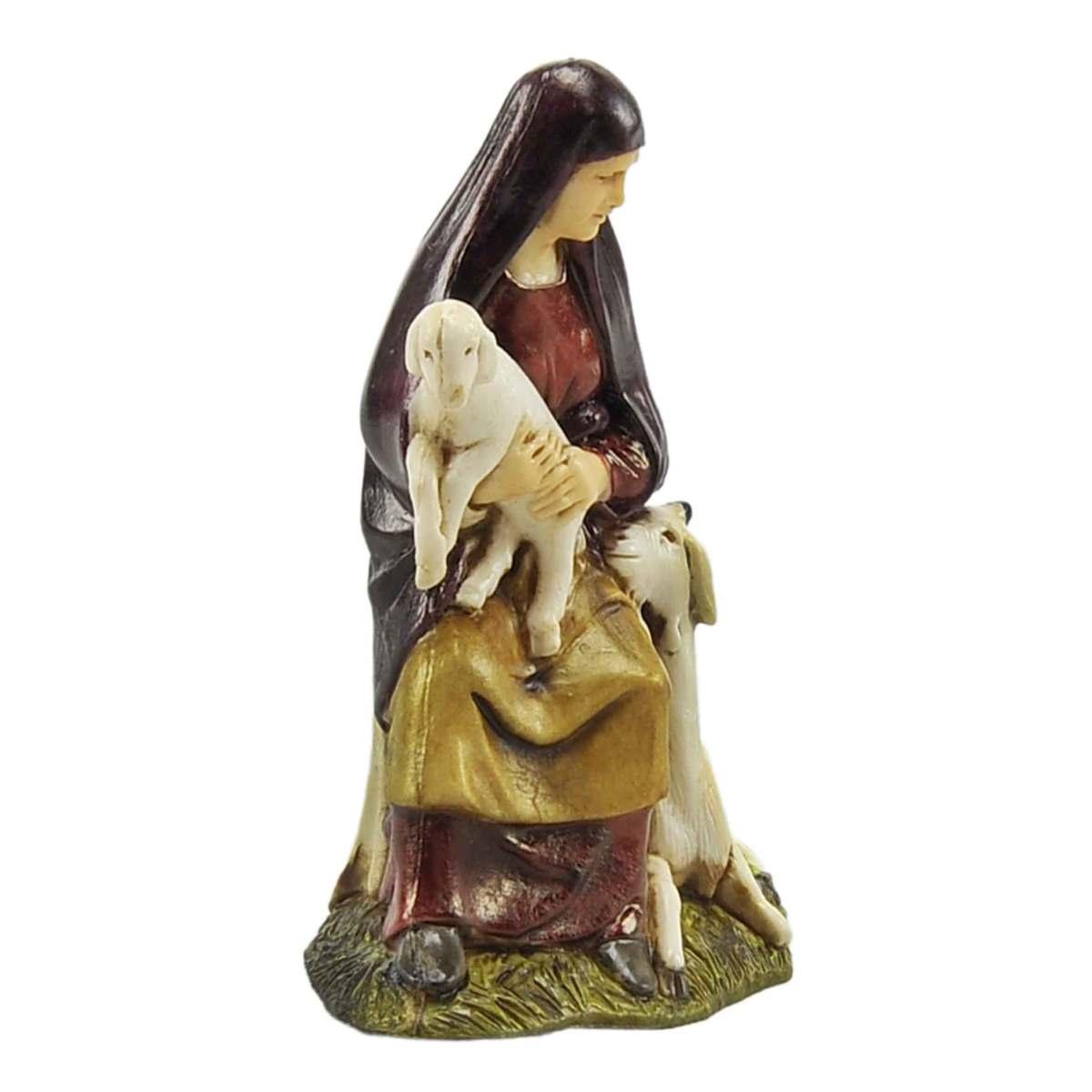 Statua presepe 10 cm donna seduta capre