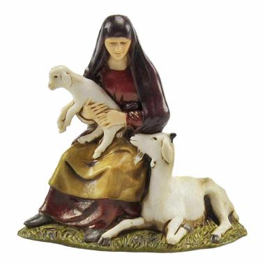 Statua presepe 10 cm donna seduta capre