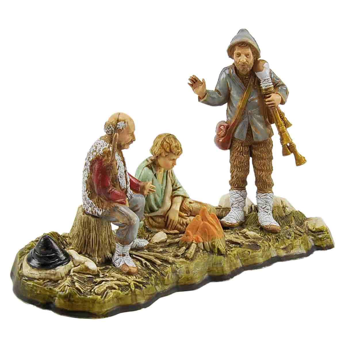 Statua presepe 10 cm pastori intorno al fuoco