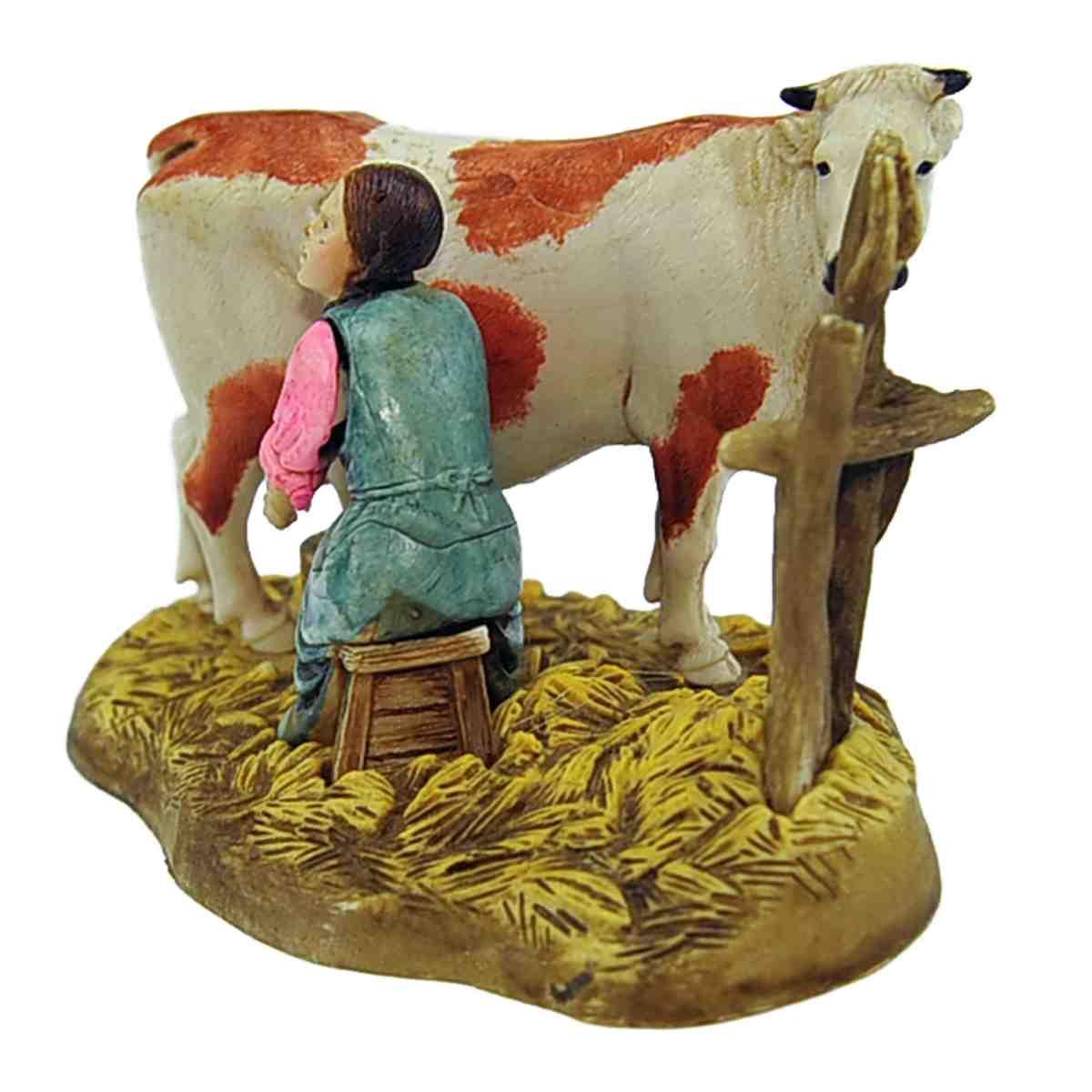 Statua presepe 10 cm mungitrice seduta mucca