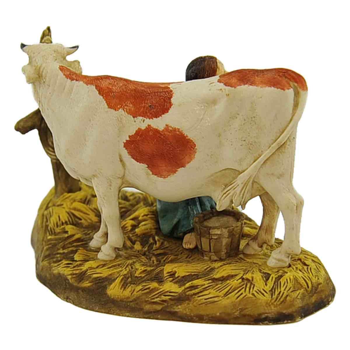Statua presepe 10 cm mungitrice seduta mucca