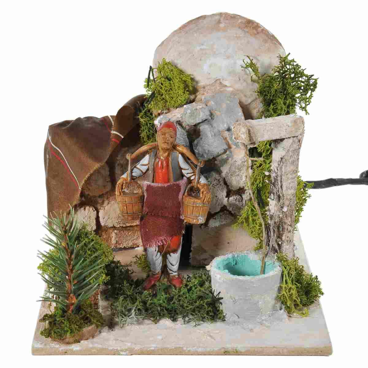 Statua presepe 10 cm uomo al pozzo movimento