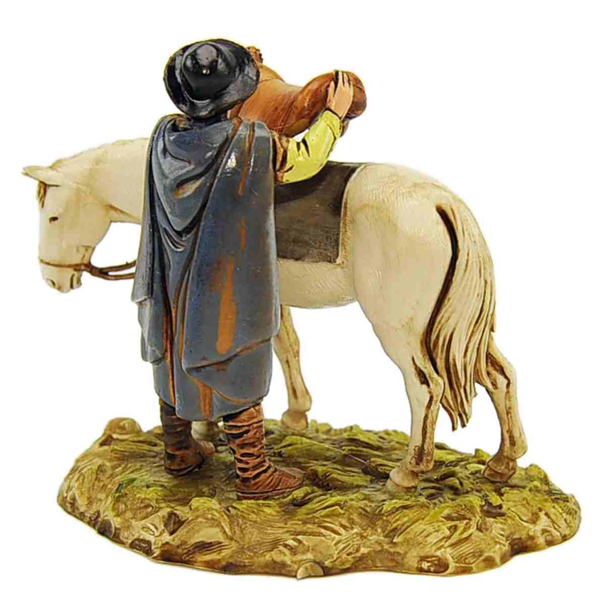 Statua presepe 10 cm uomo che sella il cavallo