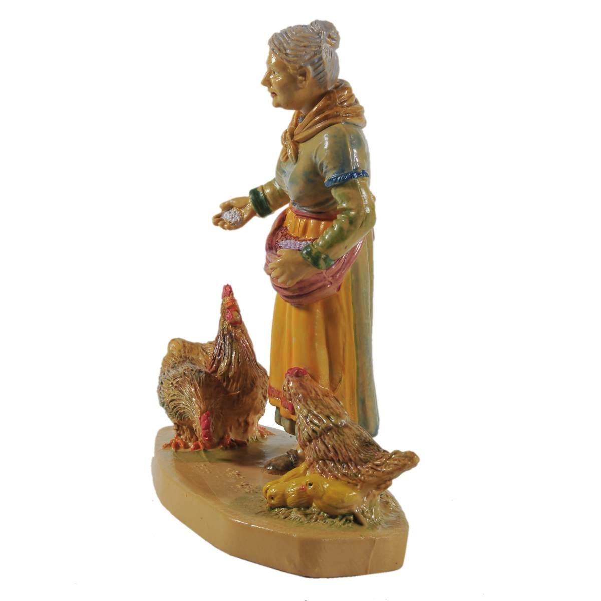 Statua presepe 12 cm donna galline