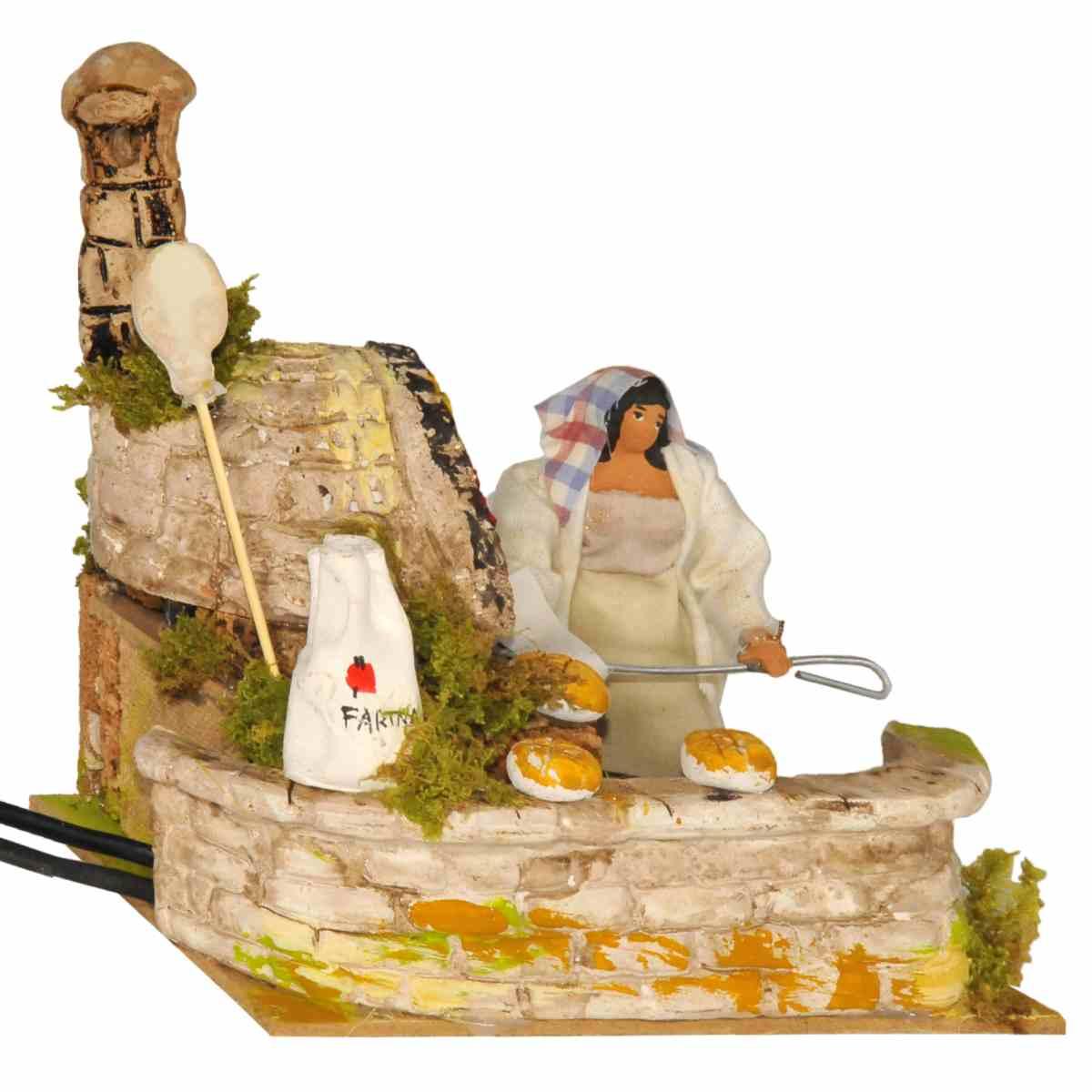 Statua presepe 12 cm movimento fornaia fuoco