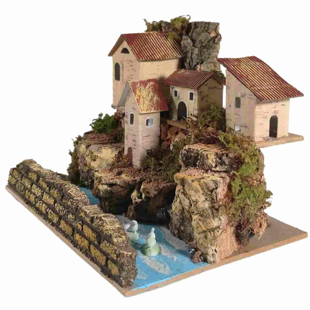 Diorama presepe luce su fiume