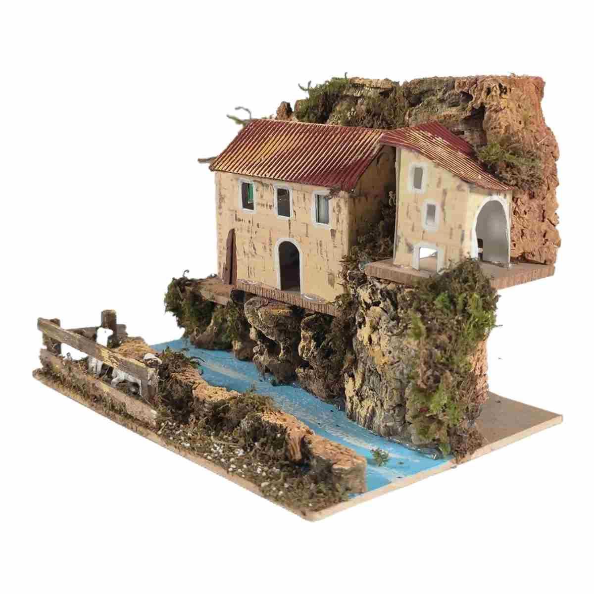 Diorama presepe luce su fiume