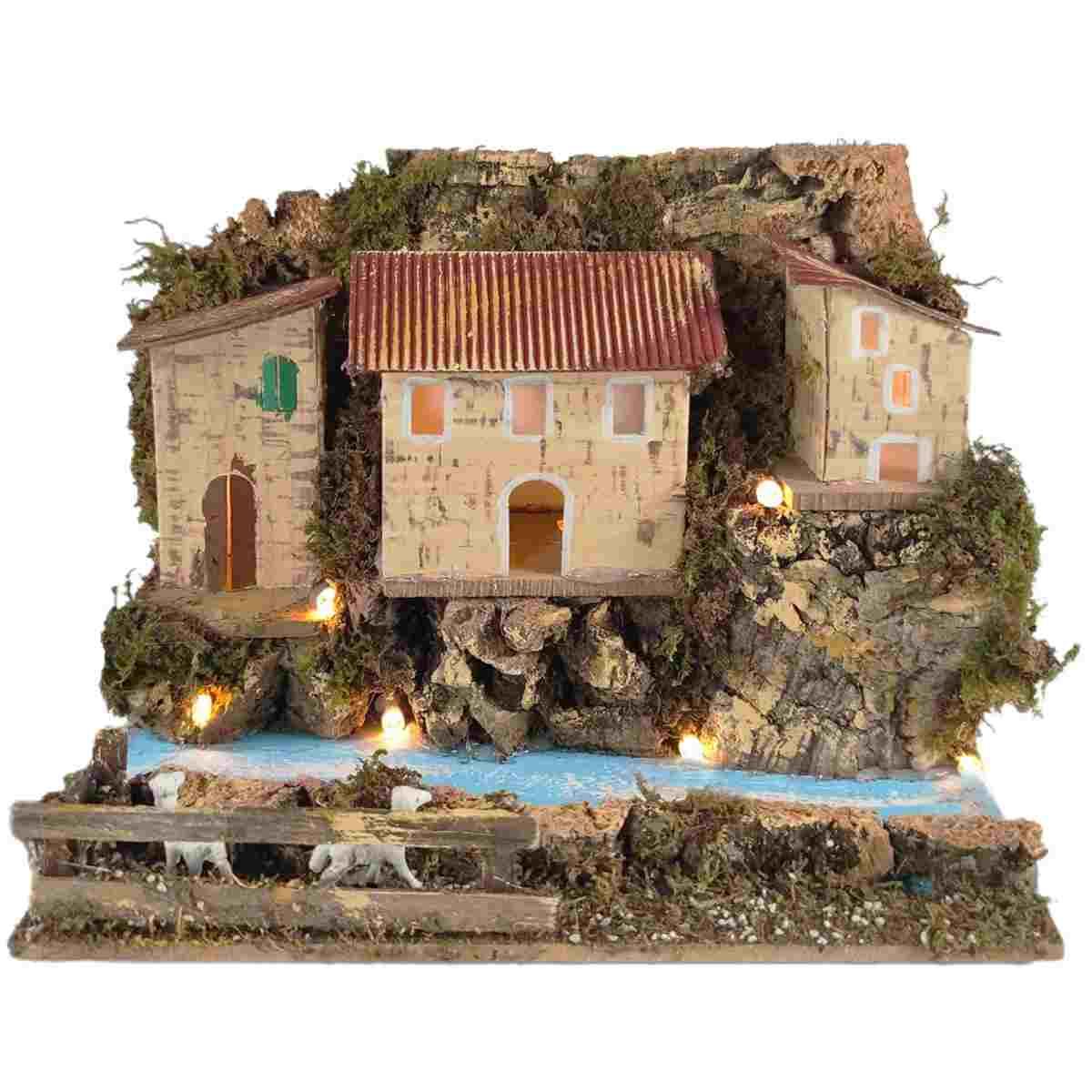 Diorama presepe luce su fiume