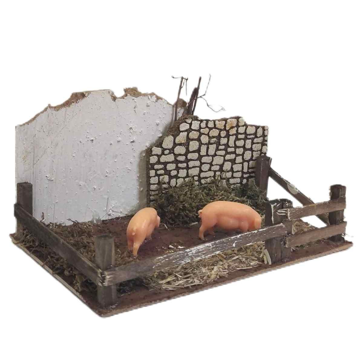 Statua presepe maiali recinto verso