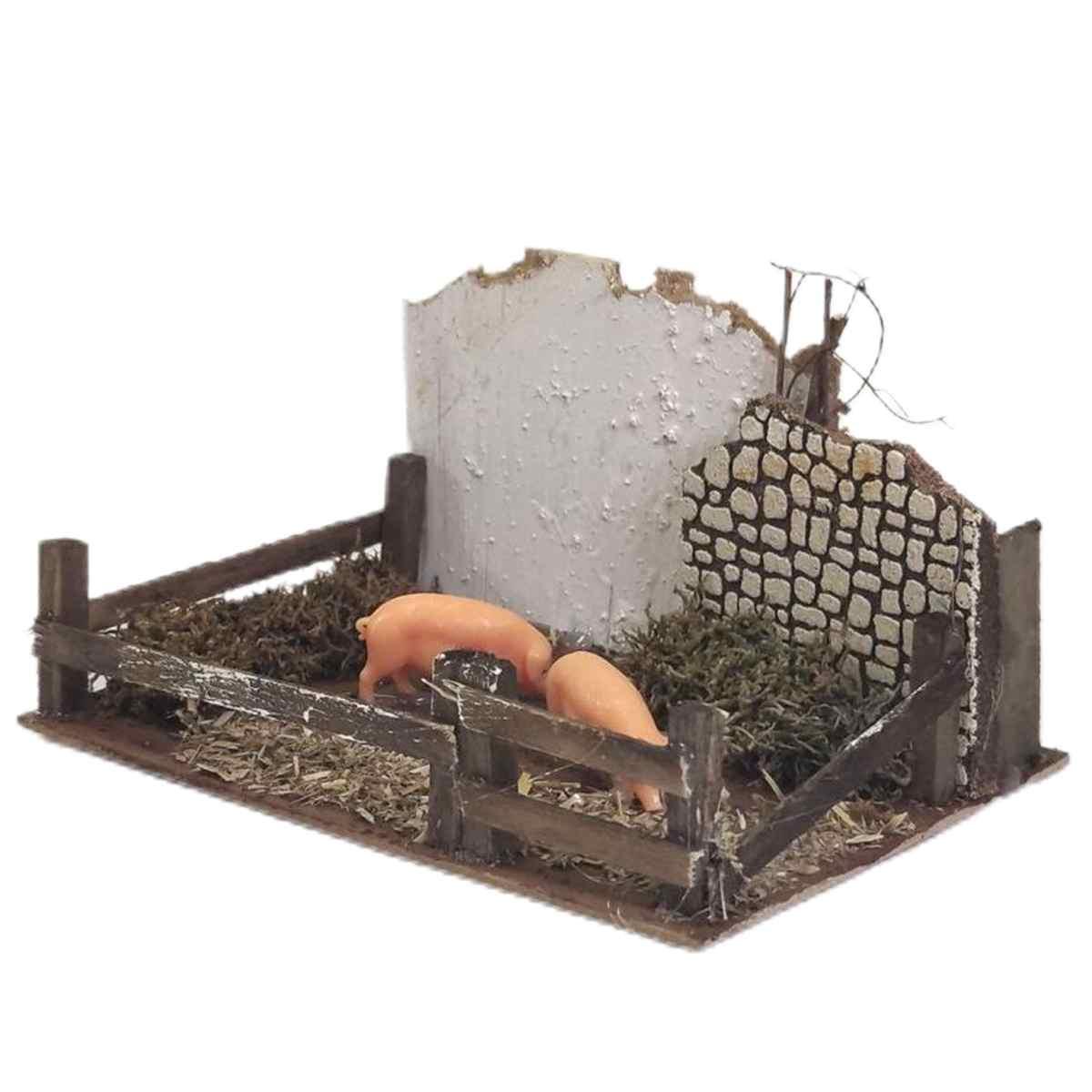 Statua presepe maiali recinto verso