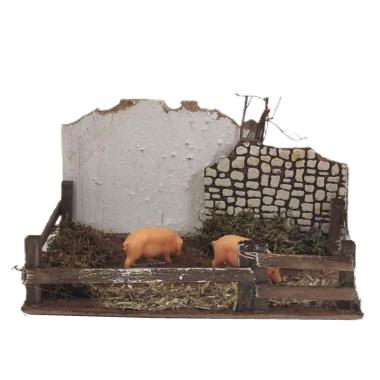 Statua presepe maiali recinto verso