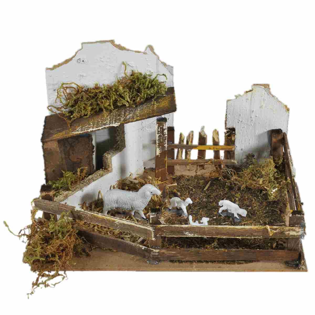 Statua presepe pecore recinto verso