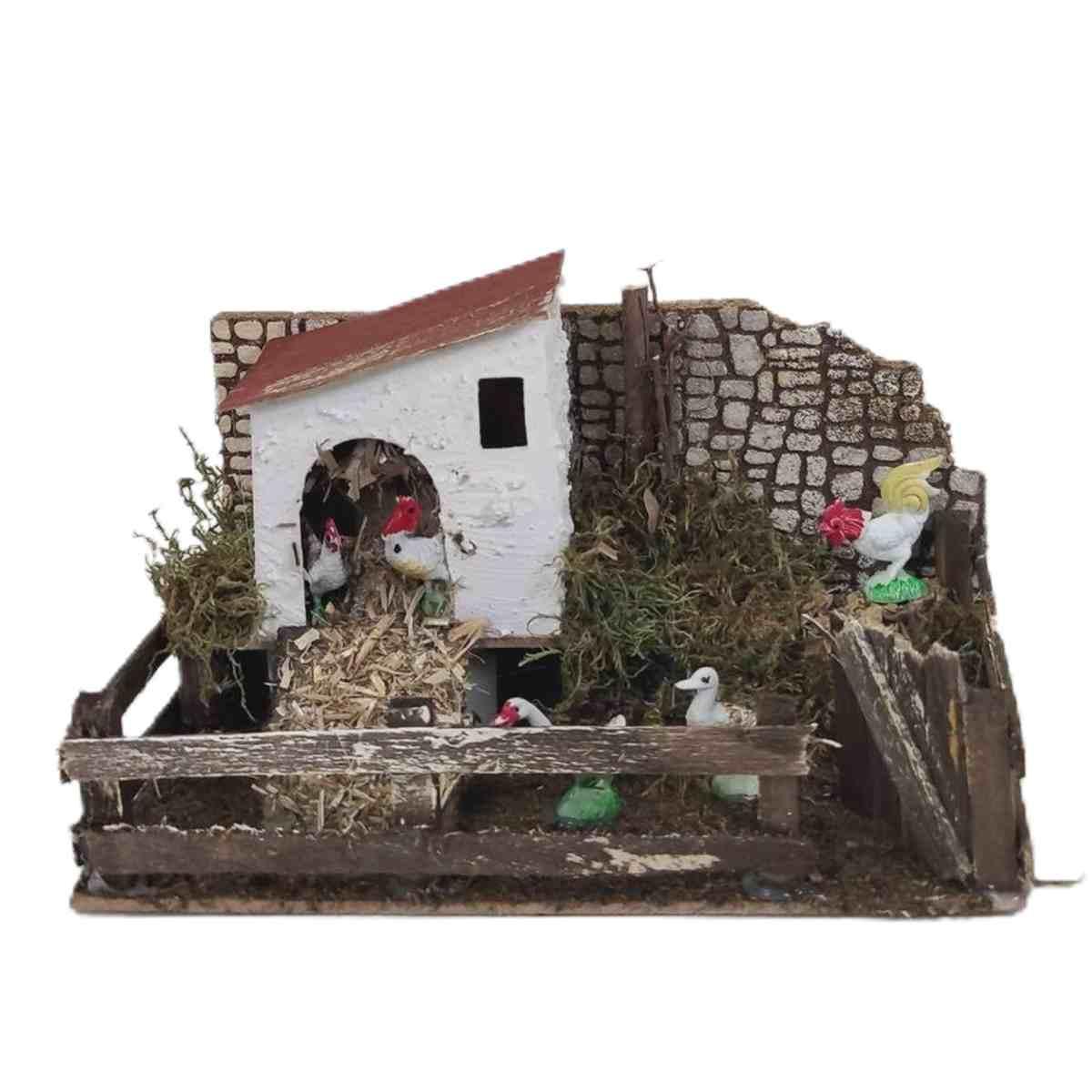 Statua presepe galline recinto verso movimento