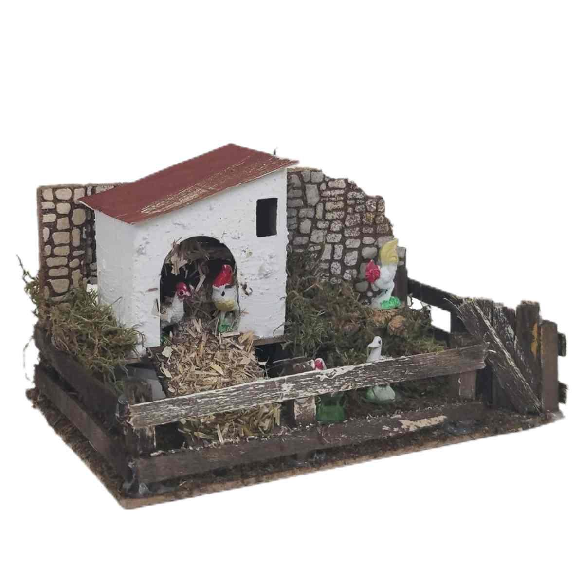 Statua presepe galline recinto verso movimento