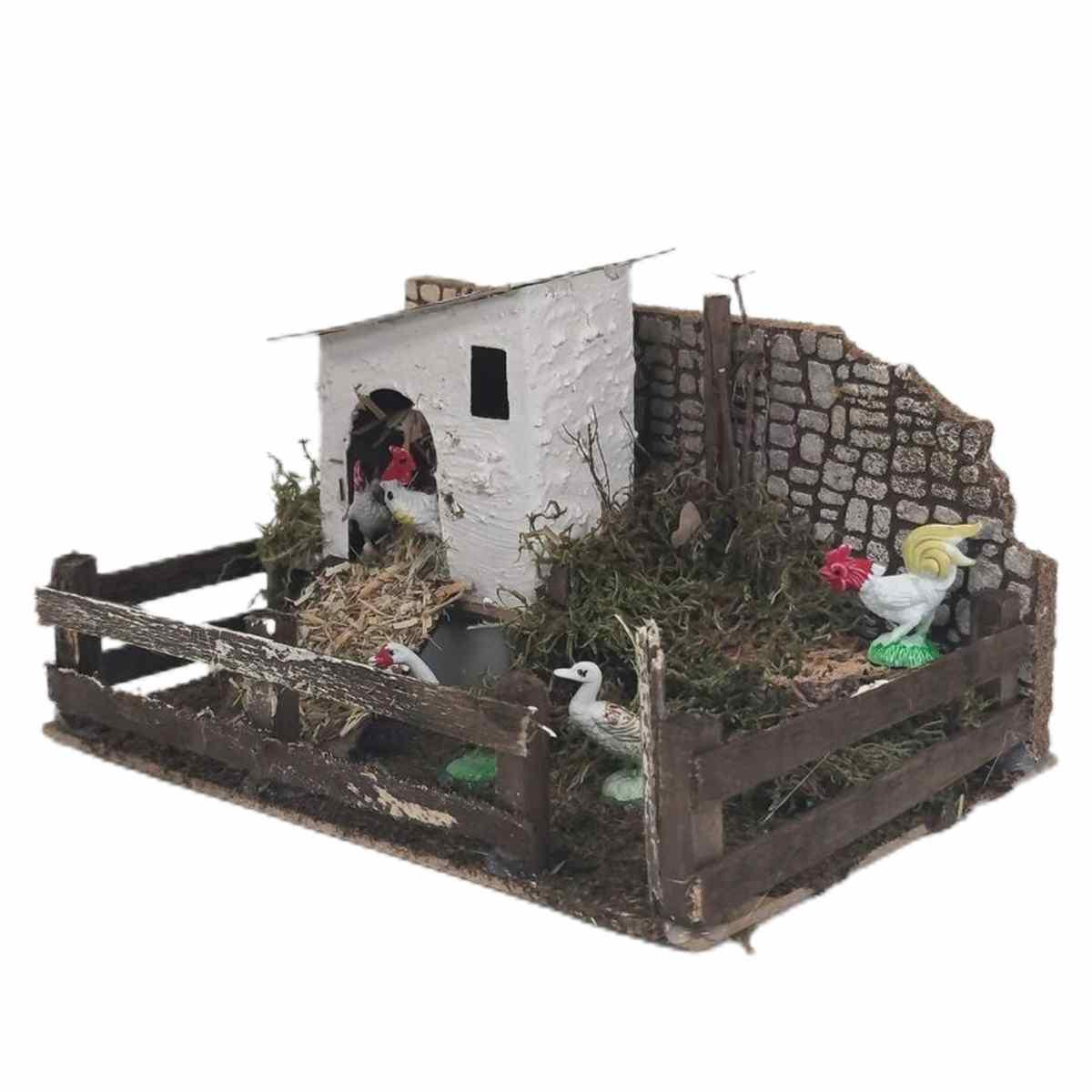 Statua presepe galline recinto verso movimento