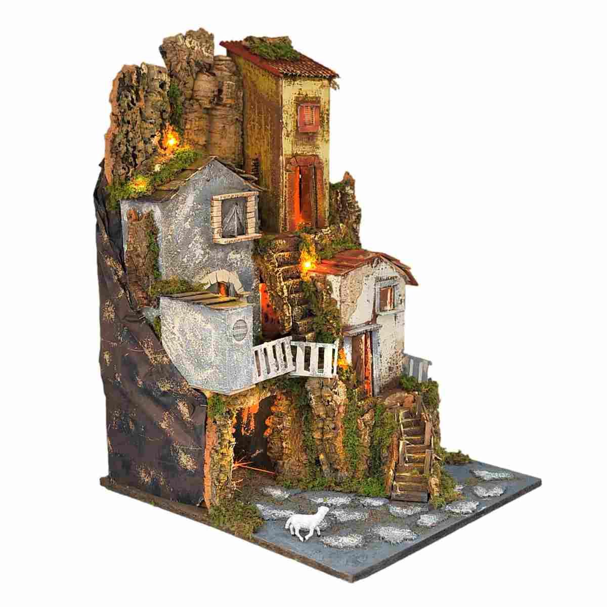 Diorama presepe luci capanna case scalinata
