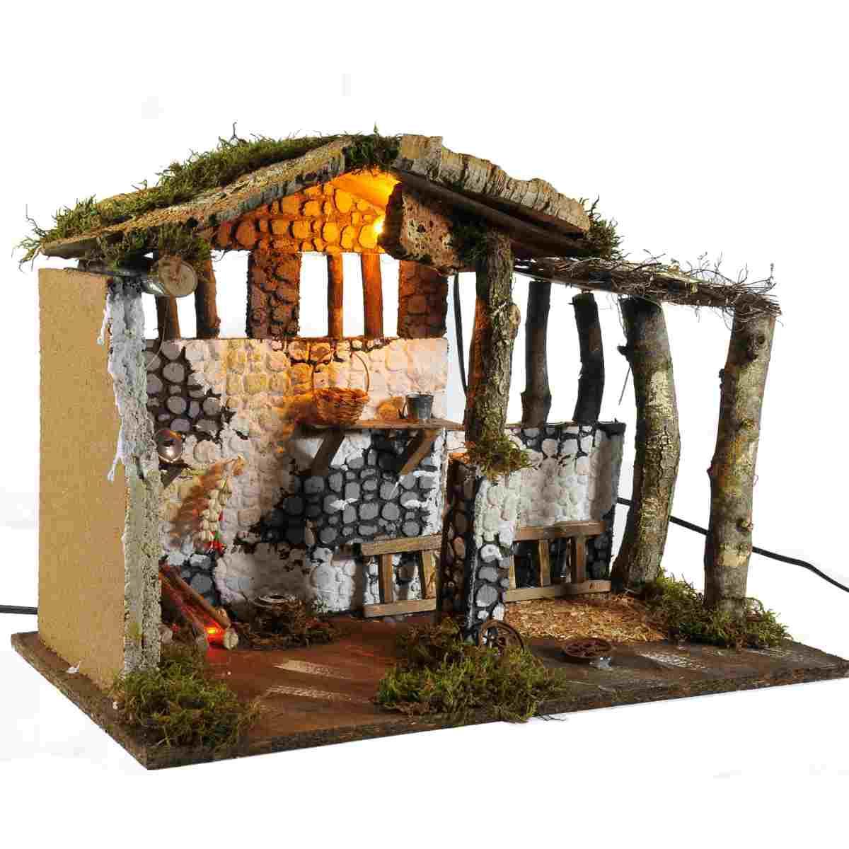 Capanna presepe legno fuoco luce