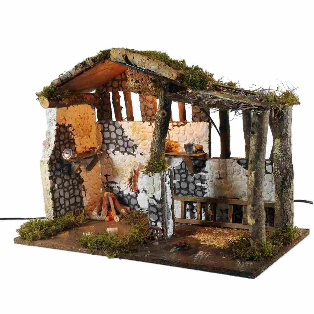 Capanna presepe legno fuoco luce