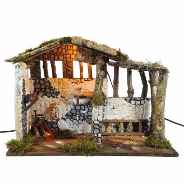 Capanna presepe legno fuoco luce