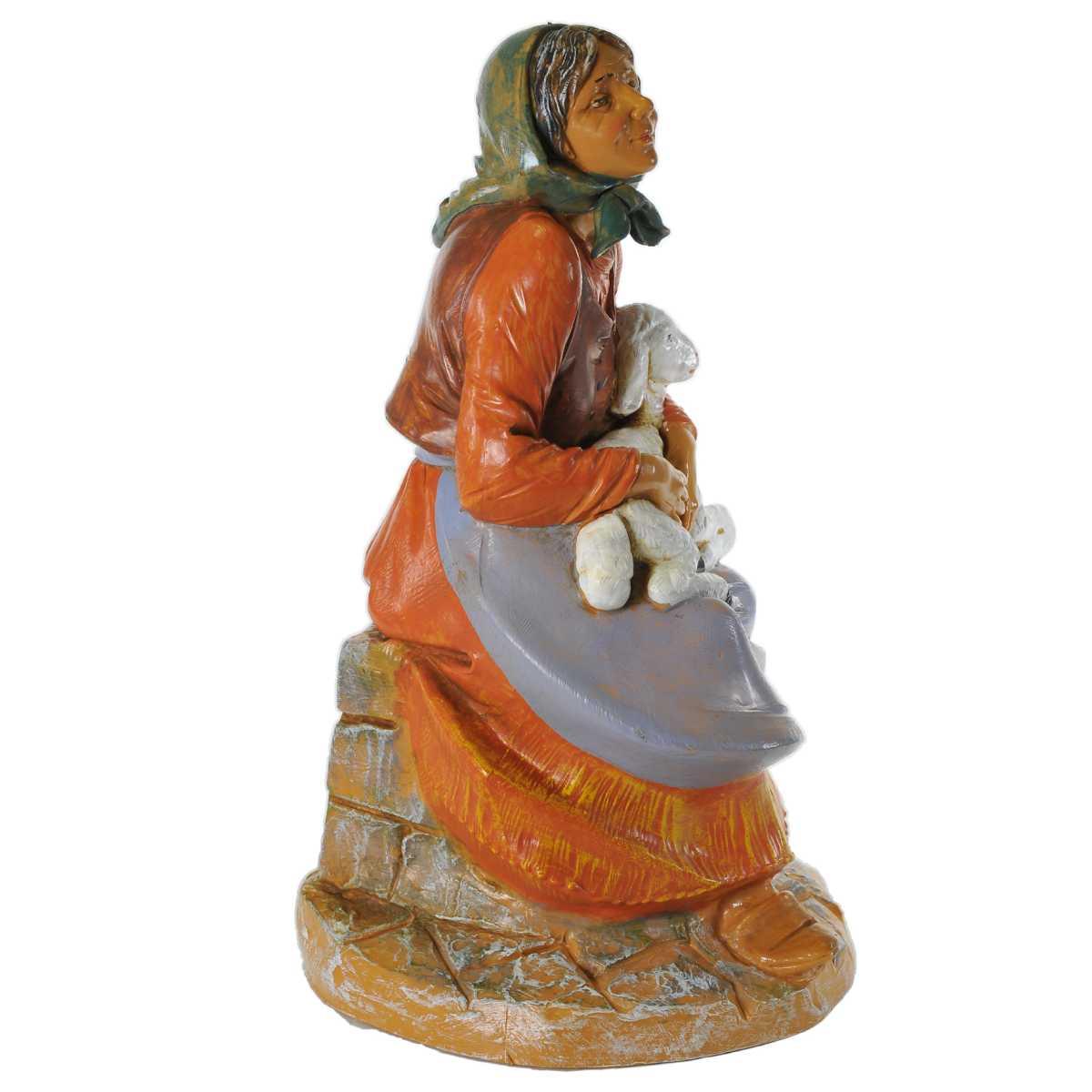 Statua presepe 30 cm pastorella seduta pecora