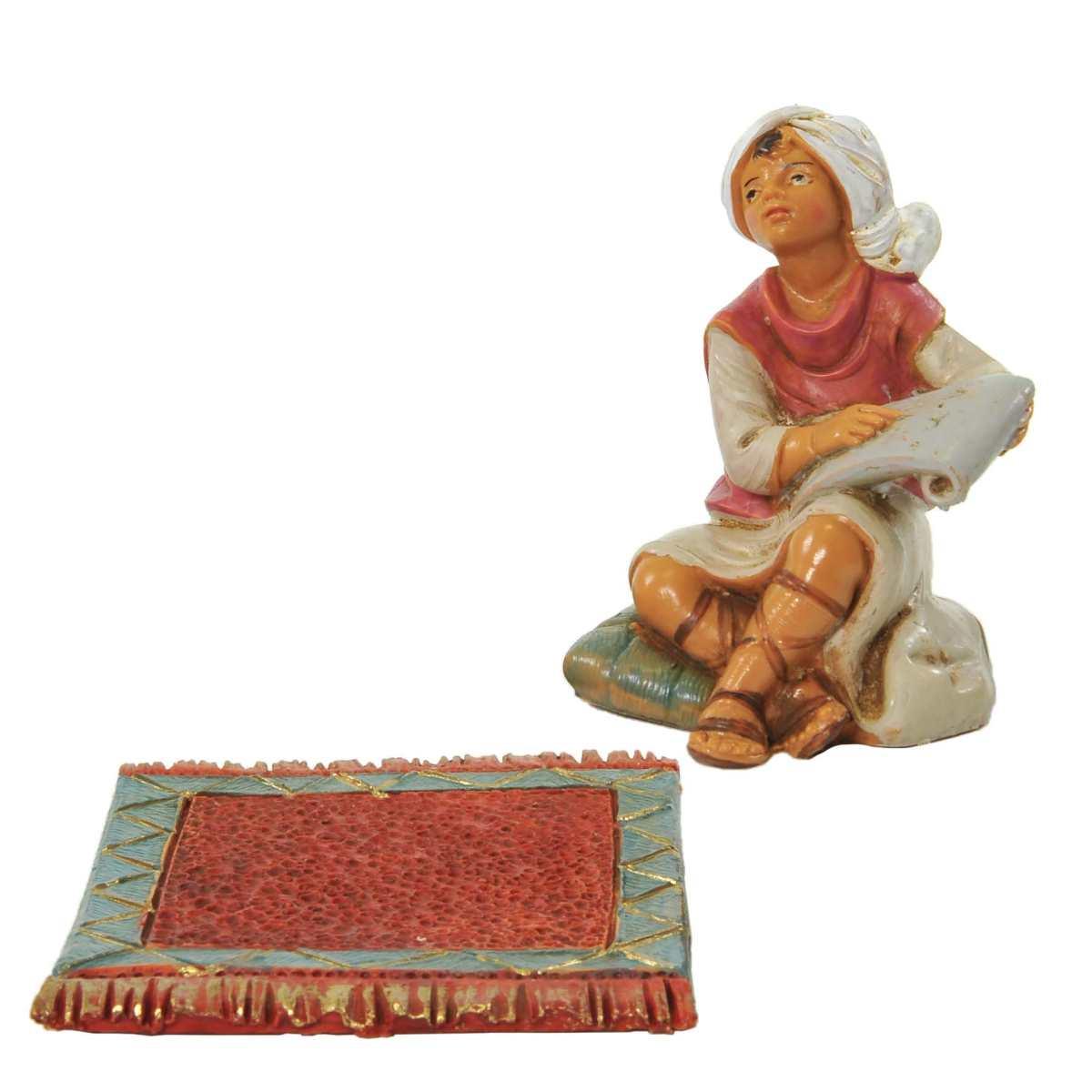 Statua presepe 12 cm pastorello seduto sul tappeto