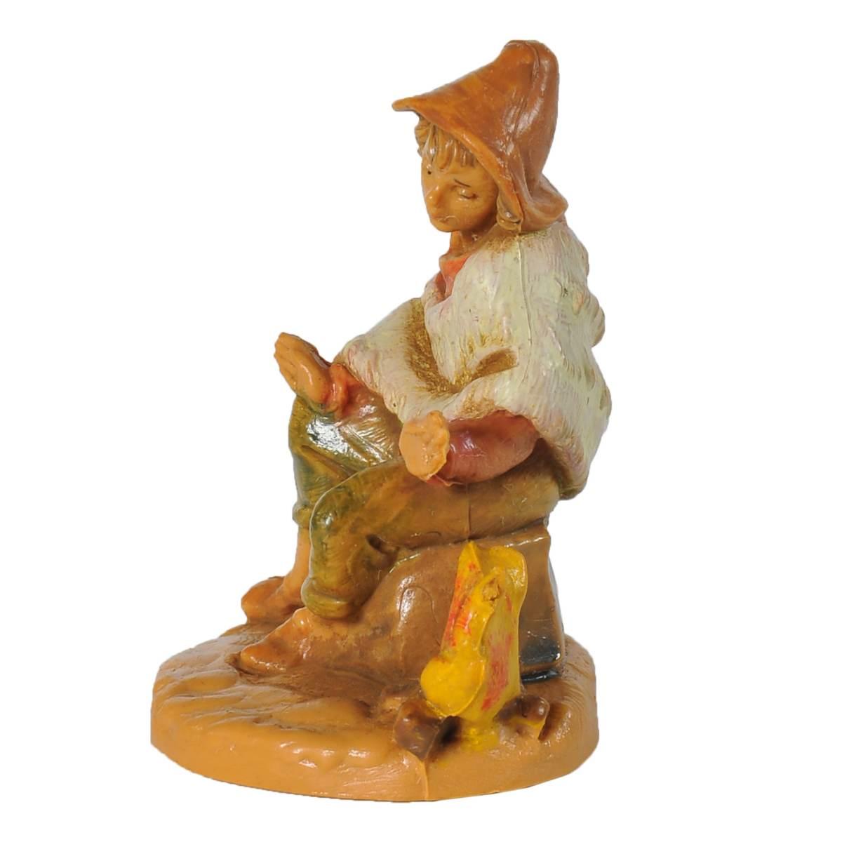 Statua presepe 6.5 cm pastore seduto fuoco