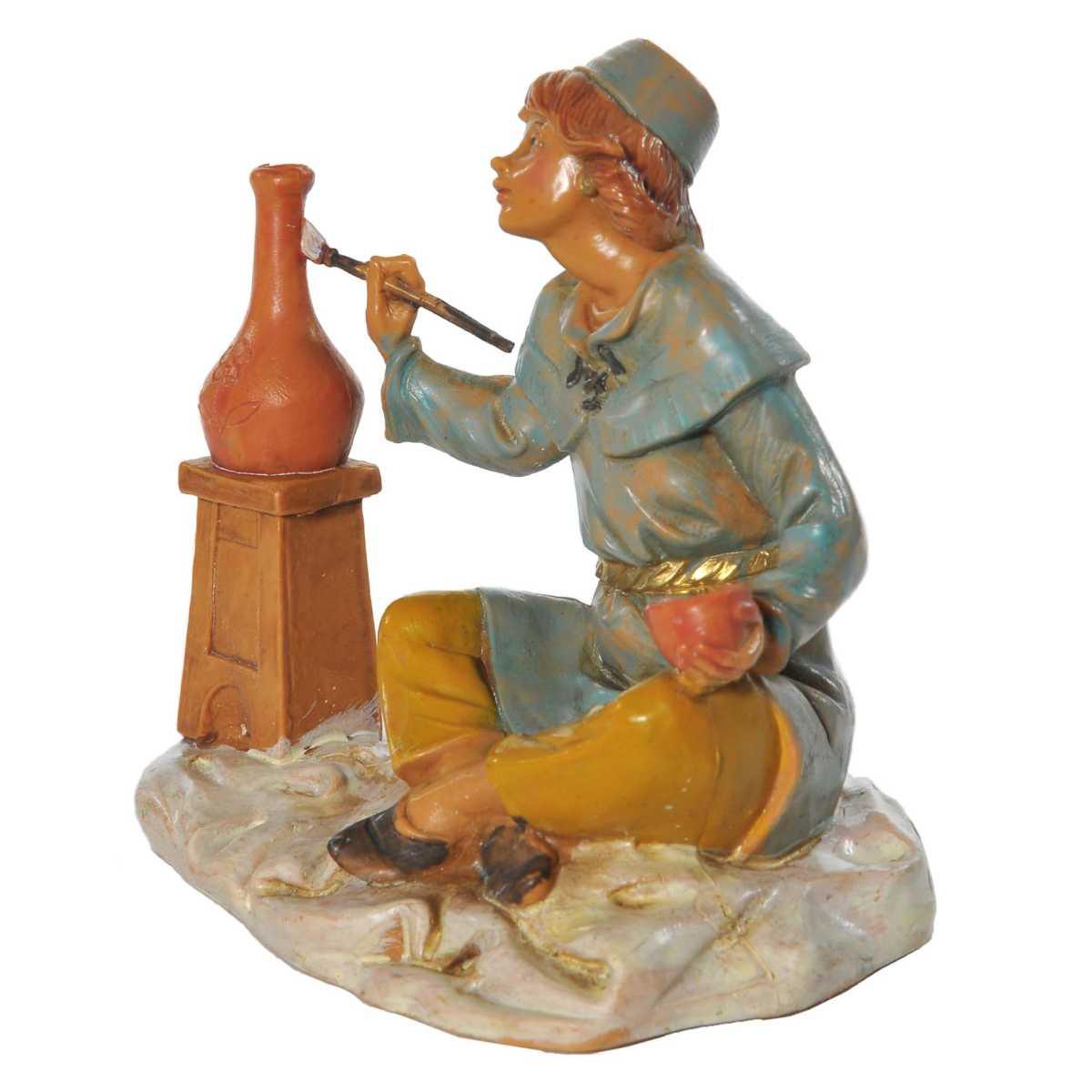 Statua presepe 12 cm pastore seduto che dipinge