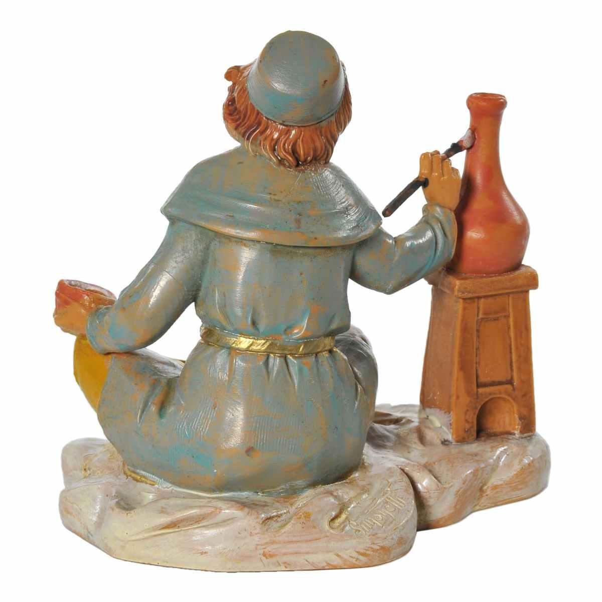 Statua presepe 12 cm pastore seduto che dipinge