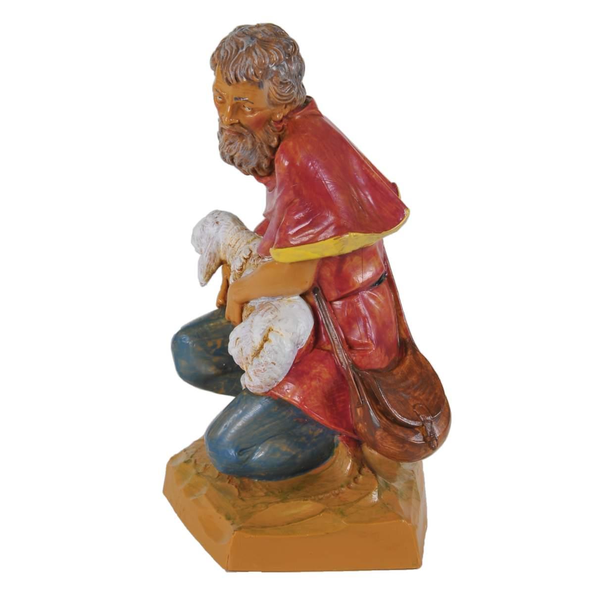 Statua presepe 19 cm pastore inginocchiato pecora