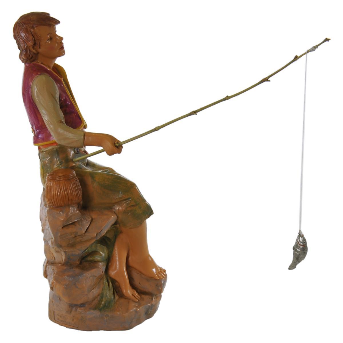 Statua presepe 30 cm pescatore seduto con canna