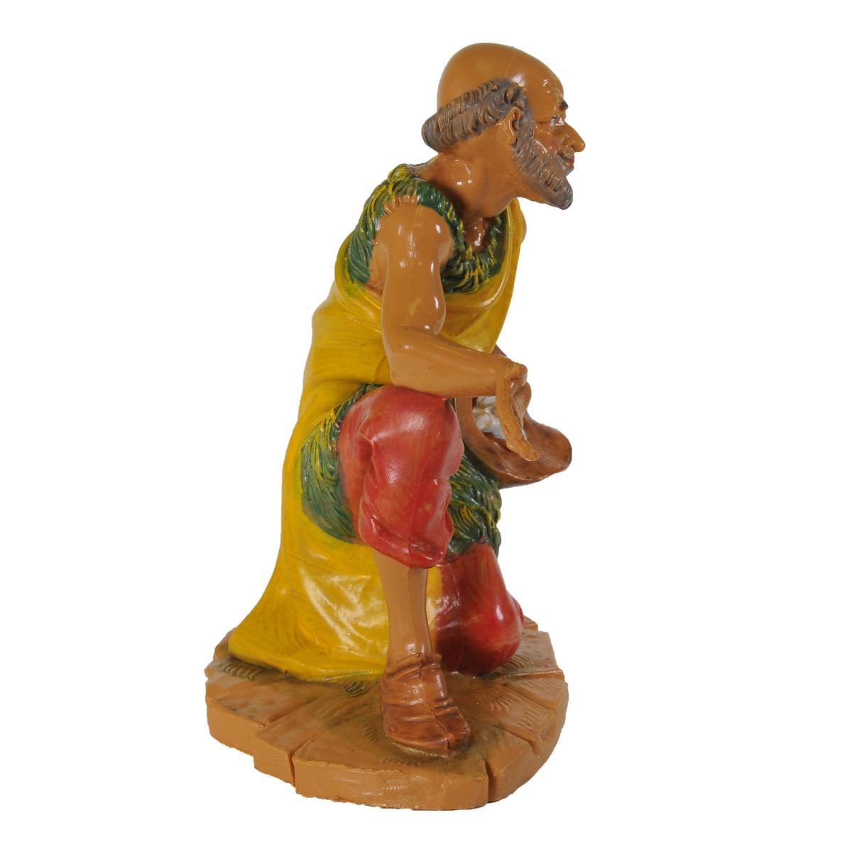 Statua presepe 19 cm pastore inginocchiato cappello uova