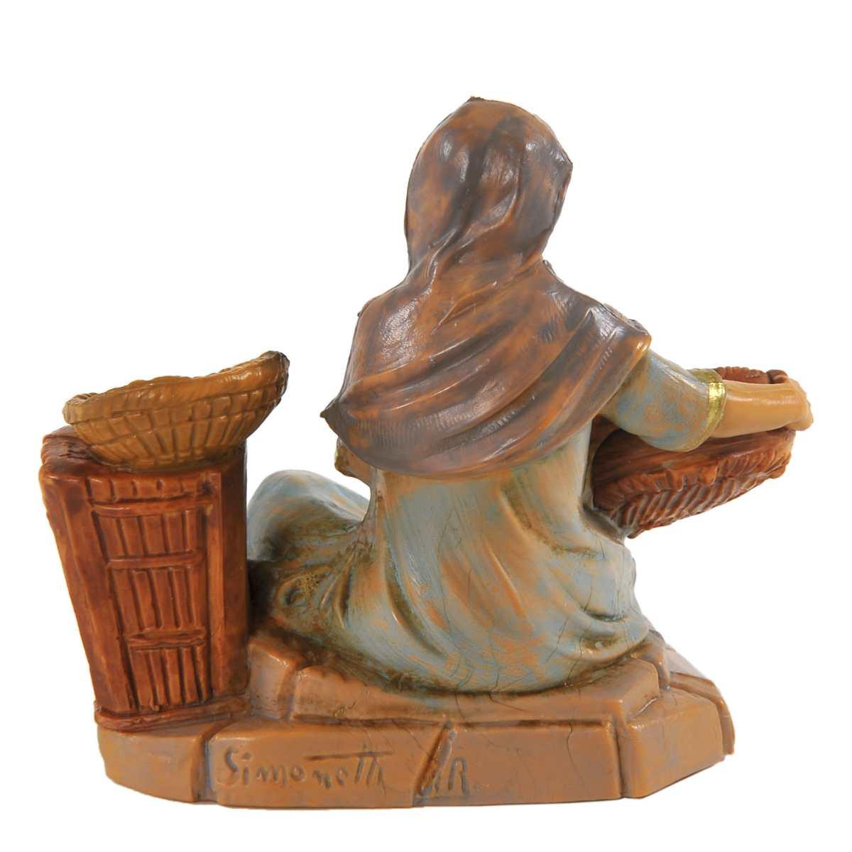 Statua presepe 9.5 cm pastorella 3 ceste seduta