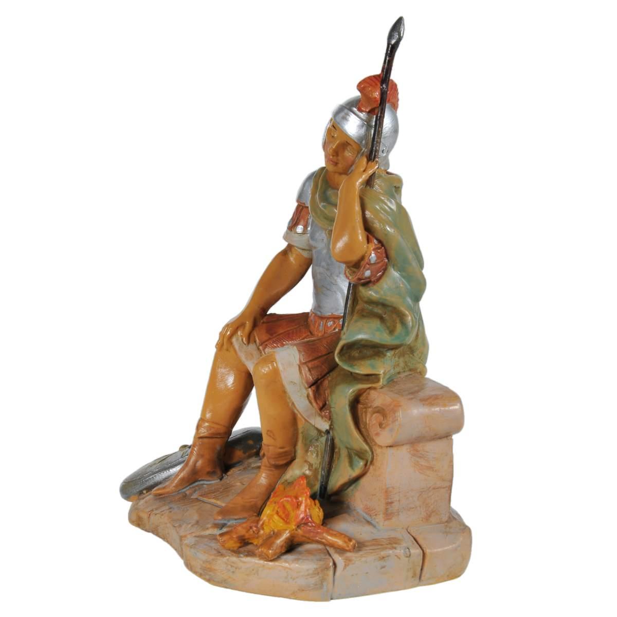 Statua presepe 12 cm soldato romano seduto fuoco