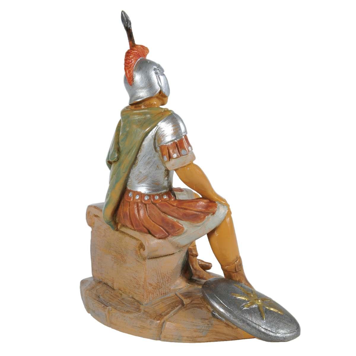 Statua presepe 12 cm soldato romano seduto fuoco
