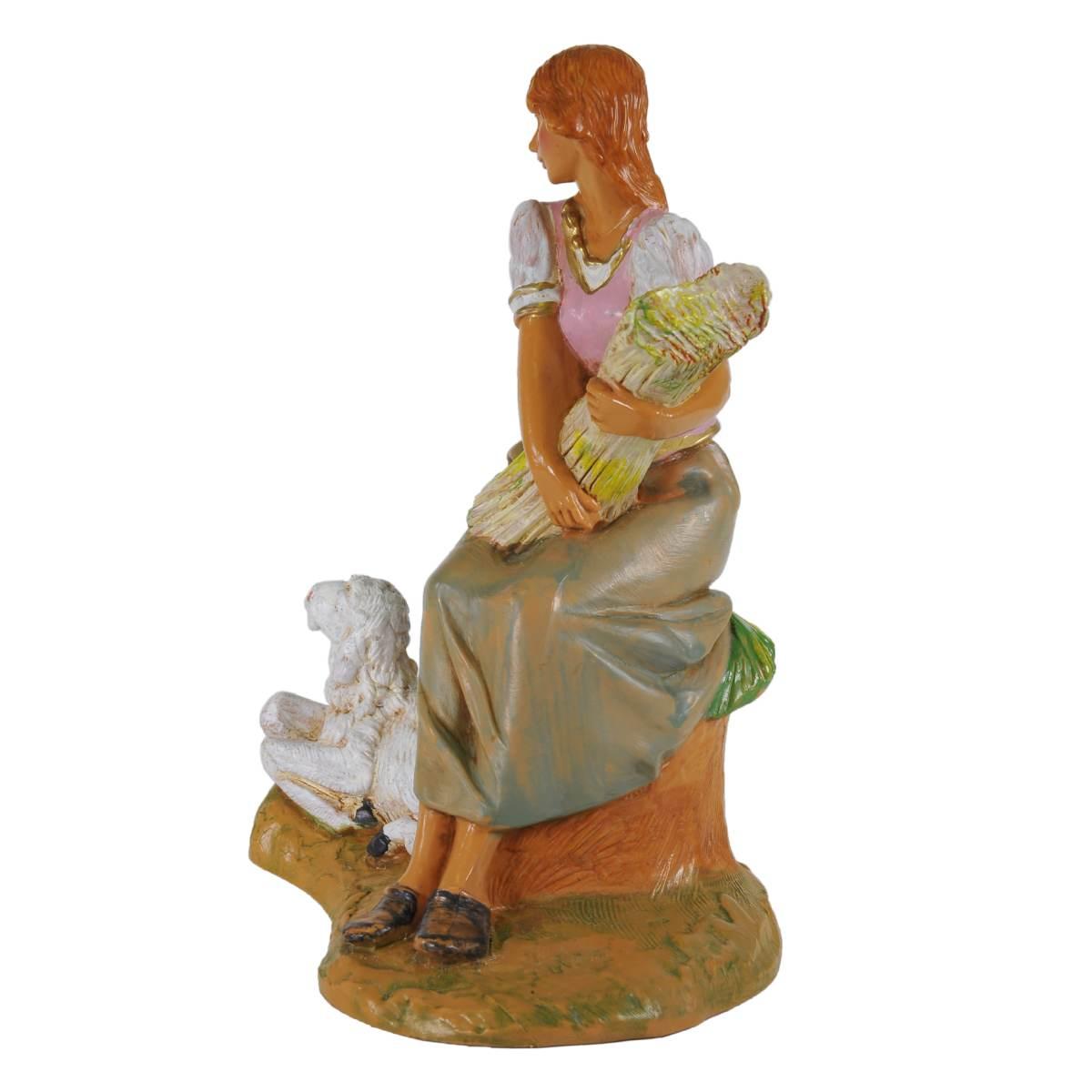 Statua presepe 19 cm pastorella seduta pecora