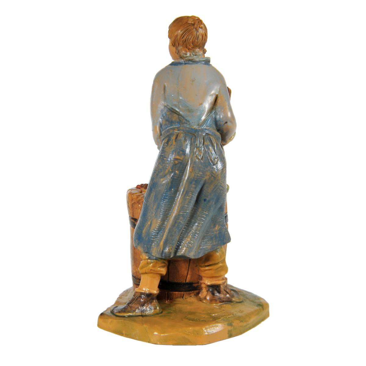 Statua presepe 12 cm ragazzo che pigia uva