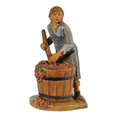 Statua presepe 12 cm ragazzo che pigia uva