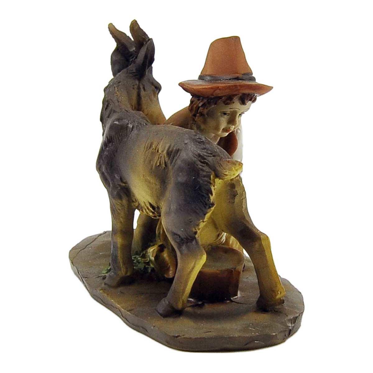 Statua presepe 15 cm bambino che munge la capretta