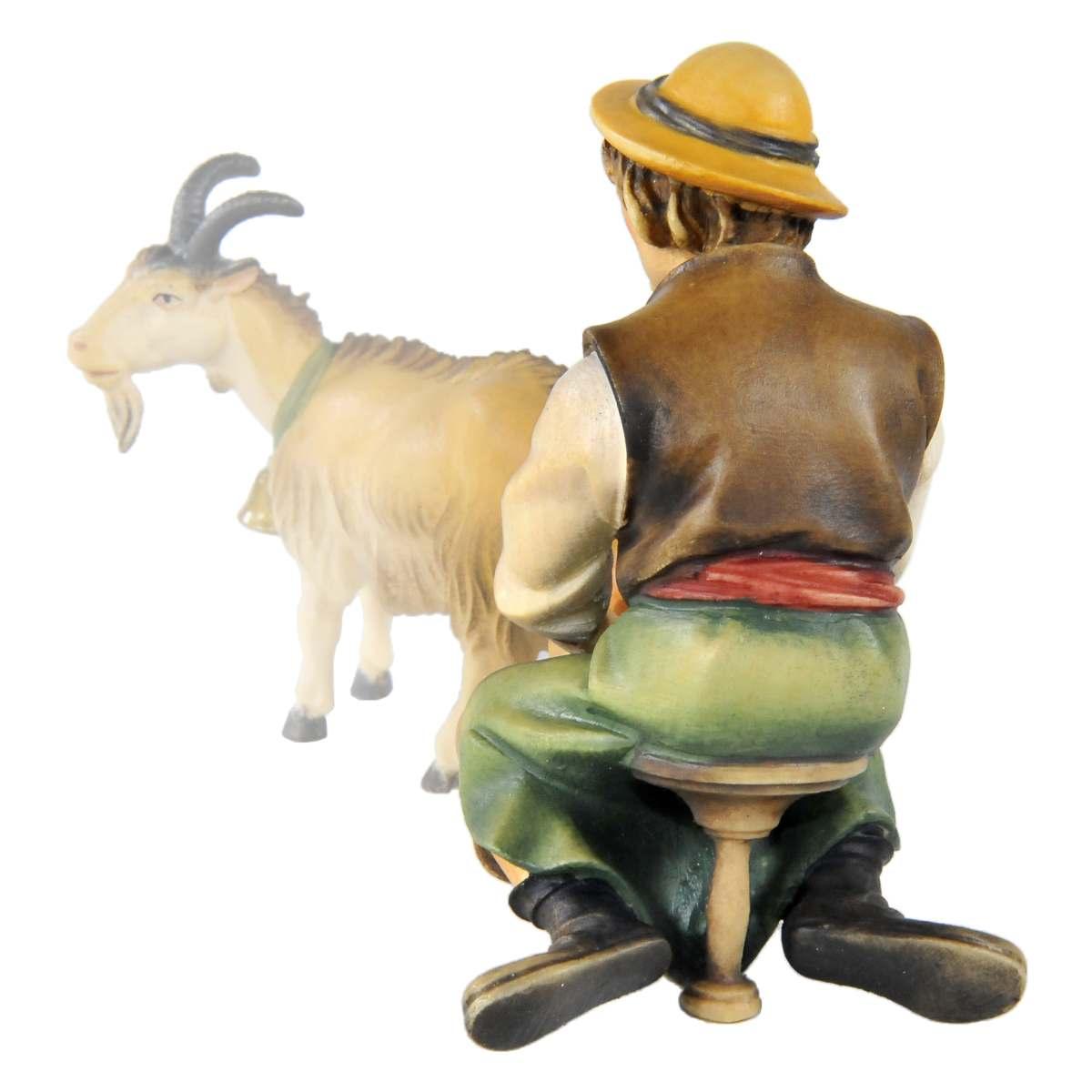 Statua presepe 15 cm scultura in legno pastore seduto che munge