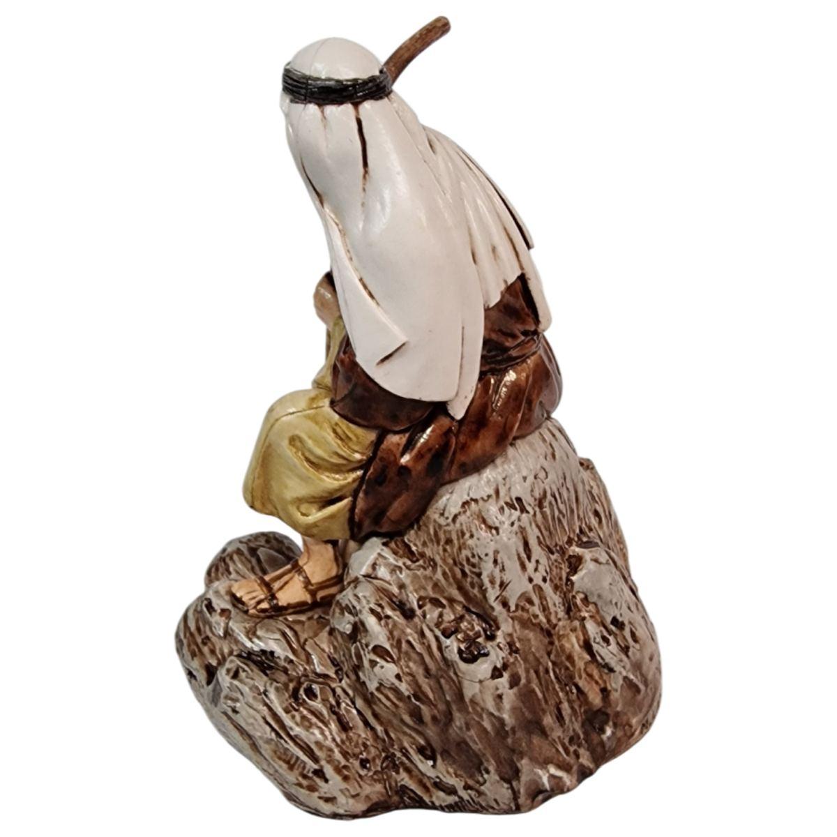 Statua presepe 13 cm guardiano seduto su pietra bastone