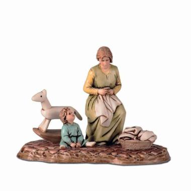 Statua presepe 10 cm donna seduta bambino cesta