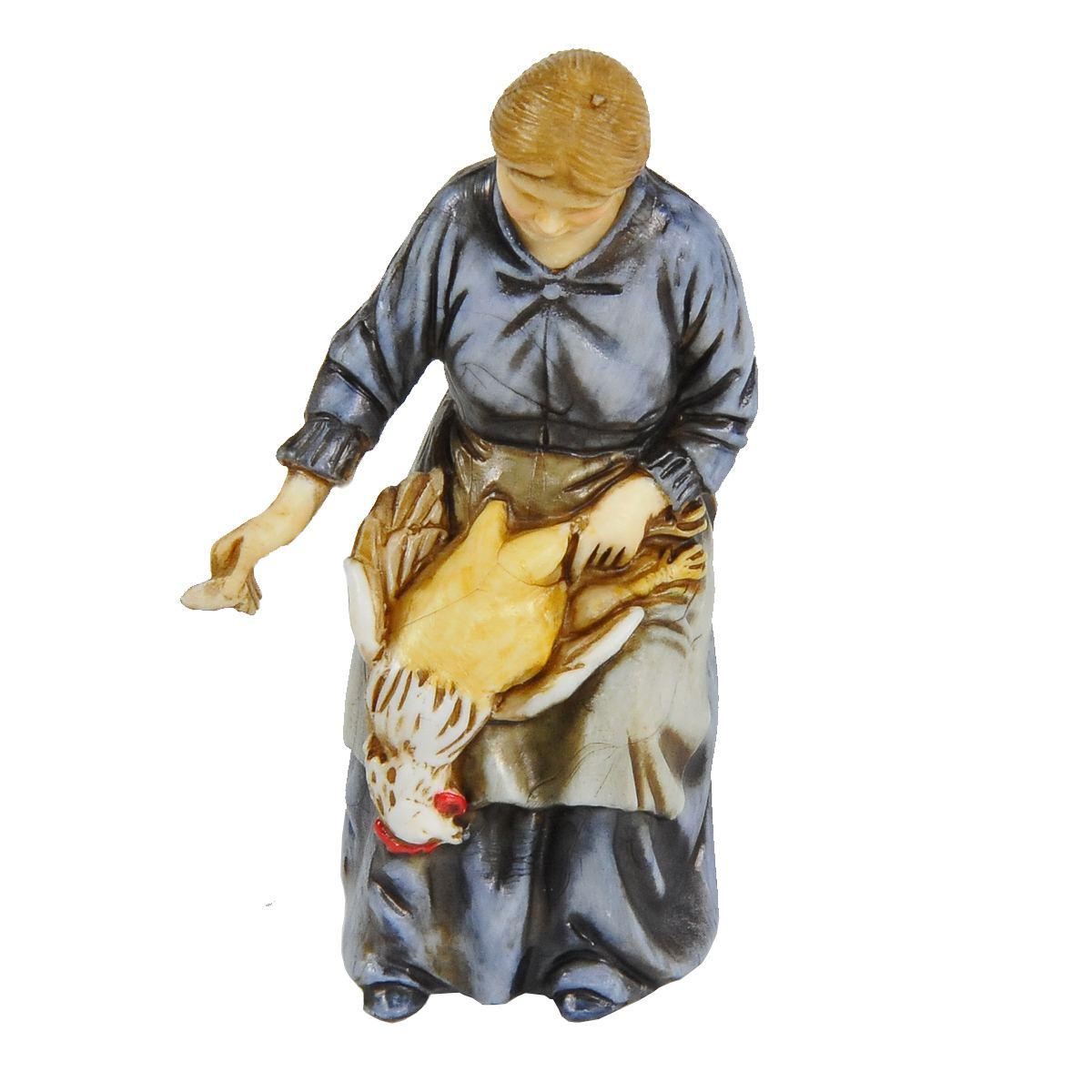 Statua presepe 10 cm donna che spenna il pollo