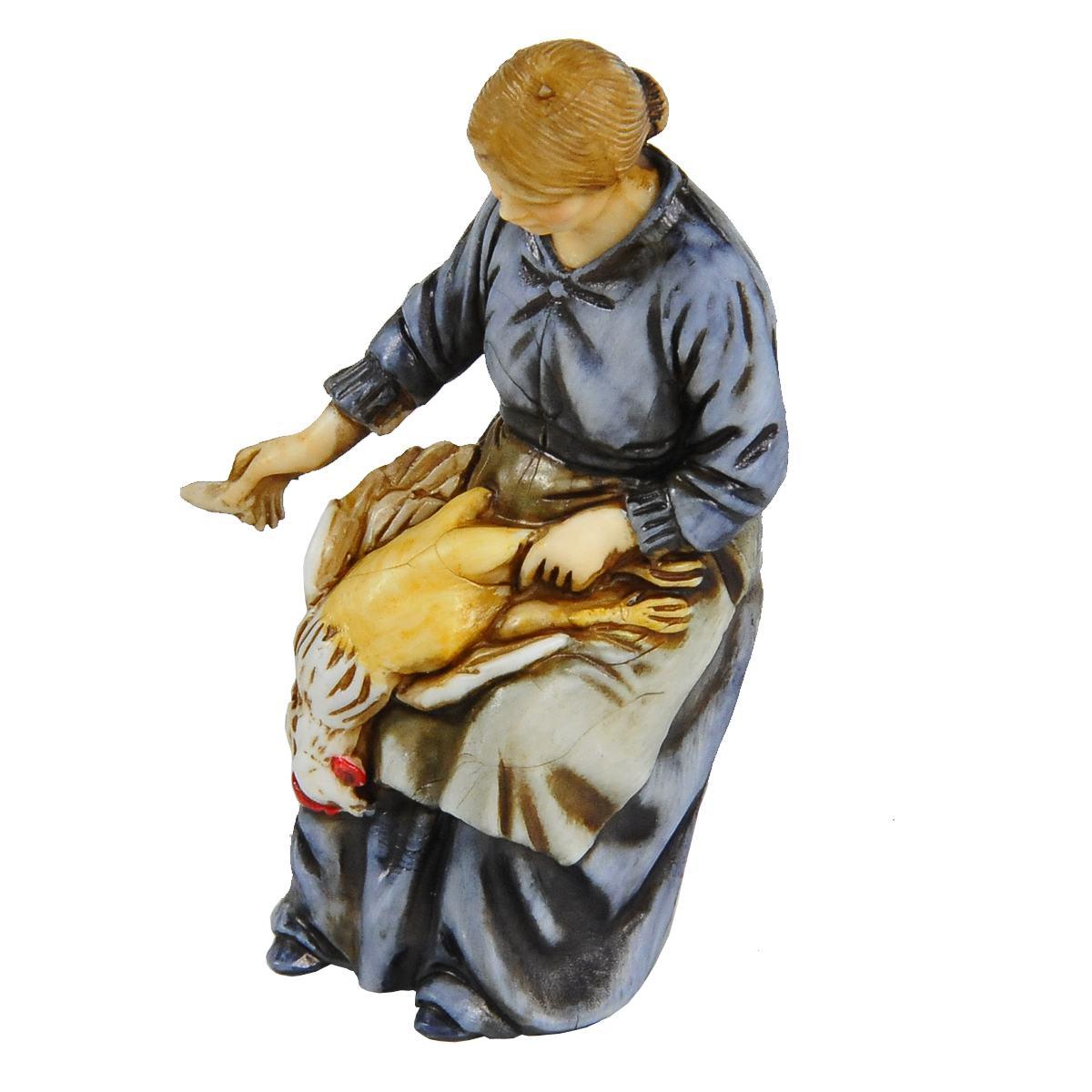 Statua presepe 10 cm donna che spenna il pollo