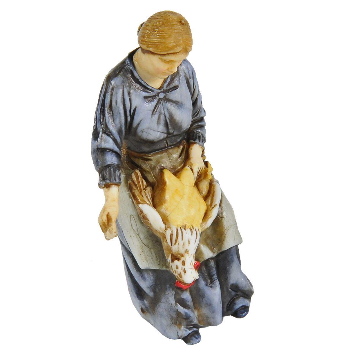 Statua presepe 10 cm donna che spenna il pollo