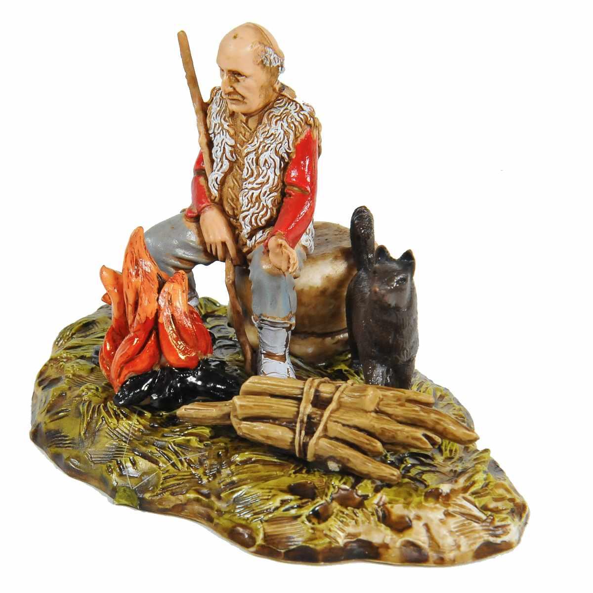 Statua presepe 10 cm pastore al fuoco cane legna