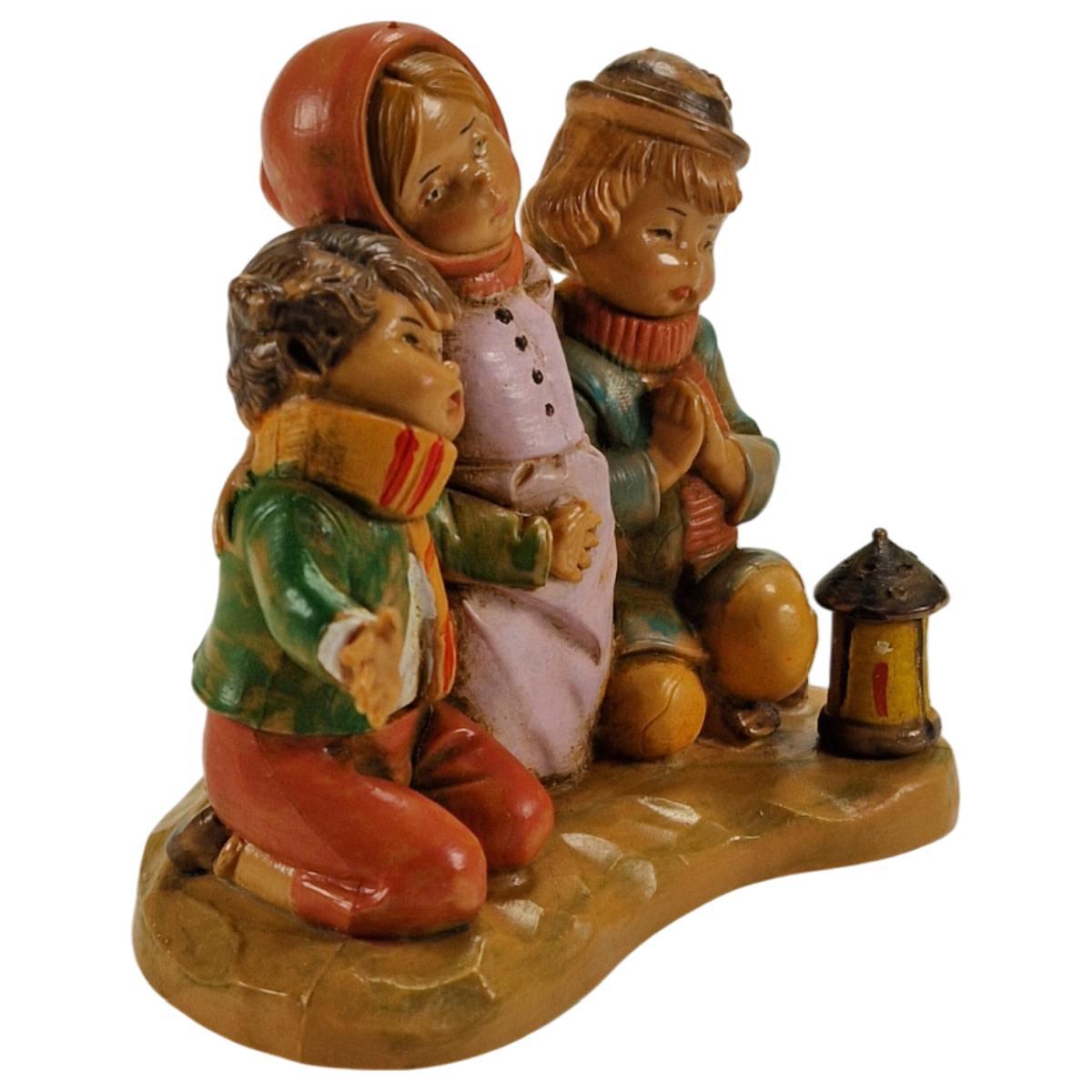 Statua presepe 12 cm bambini inginocchiati lanterna