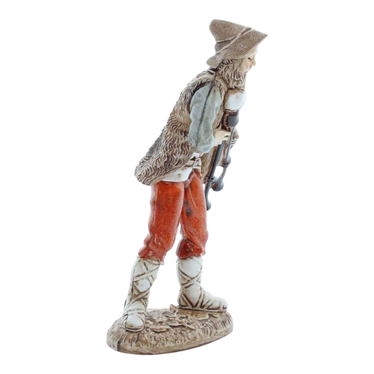 Statua presepe 12 cm zampognaro che suona la zampogna